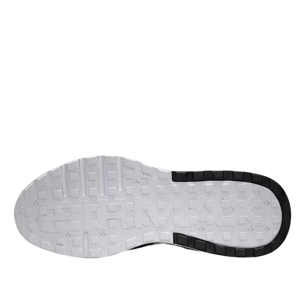 Close-up of a shoe sole with tread pattern on a white background