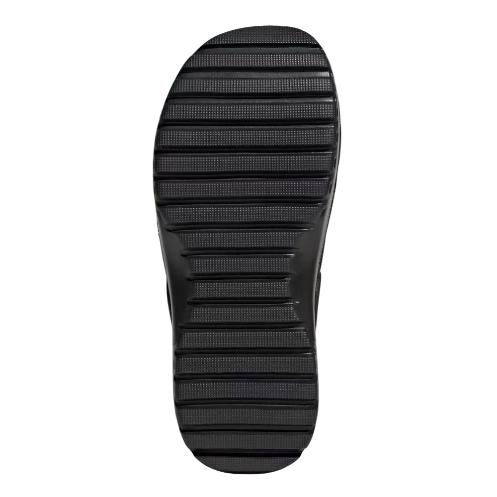 Black sole of a shoe on a light gray background