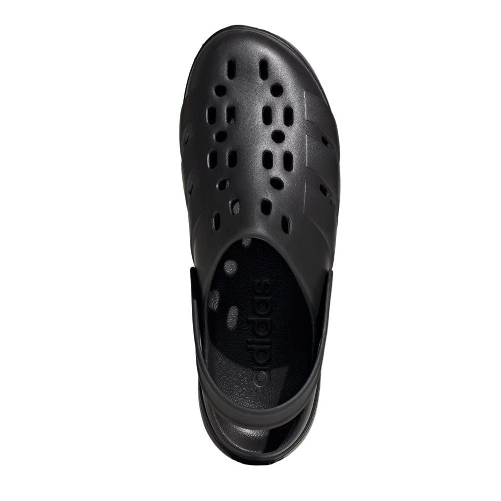 Black sandal with a brand logo on a light gray background
