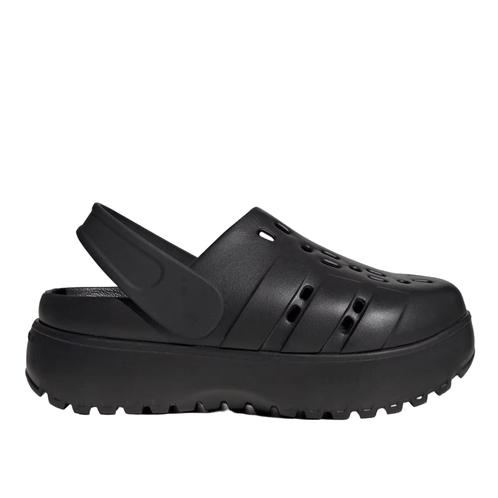 Black clog shoe on a light gray background