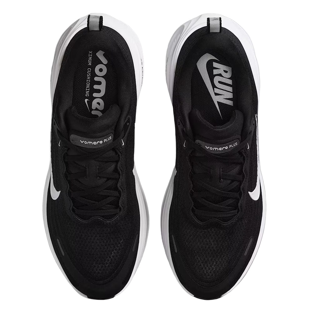 Black running shoes with white soles on a white background