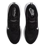 Black running shoes with white soles on a white background