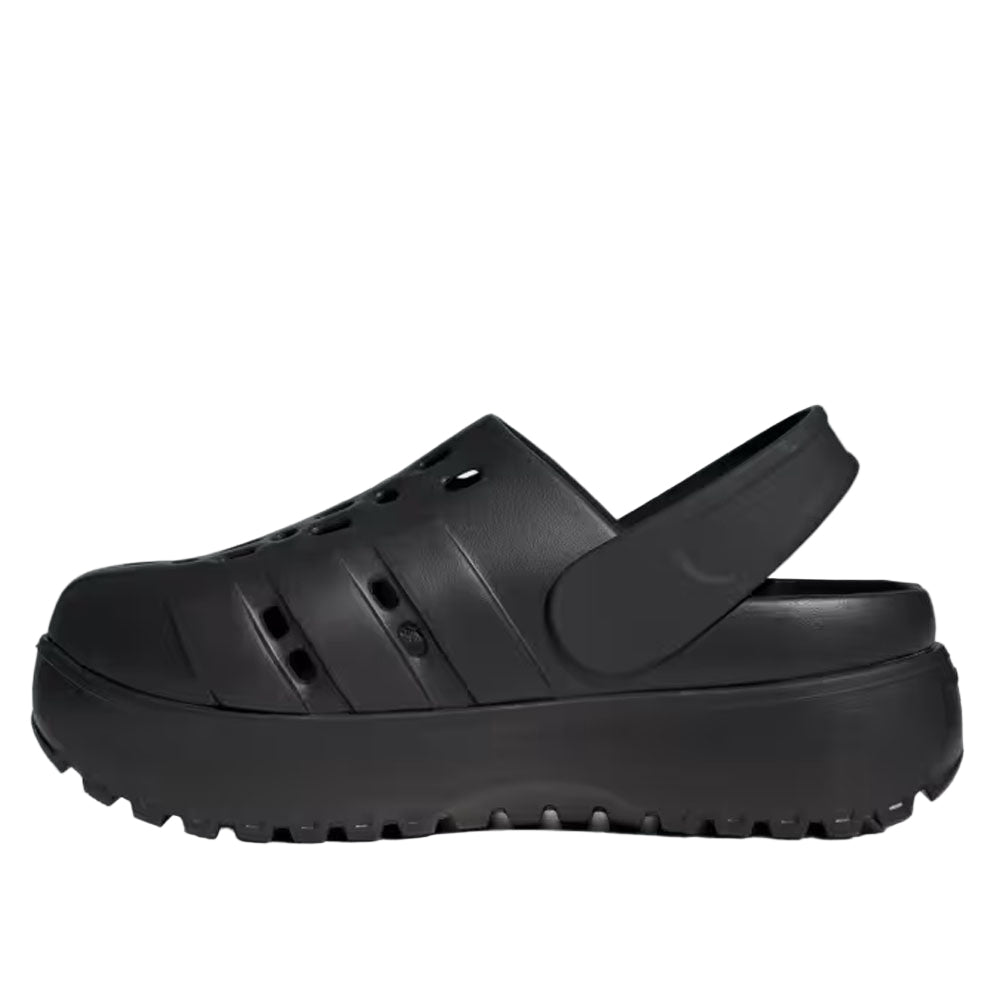 Black clog shoe on a light gray background