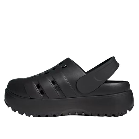 Black clog shoe on a light gray background