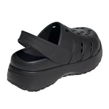 Black clog shoe on a light gray background