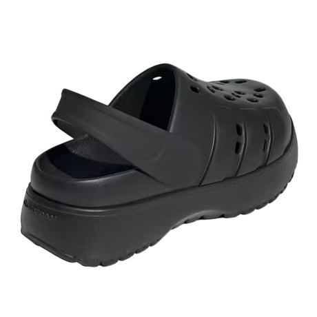 Black clog shoe on a light gray background