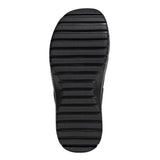 Black sole of a shoe on a light gray background