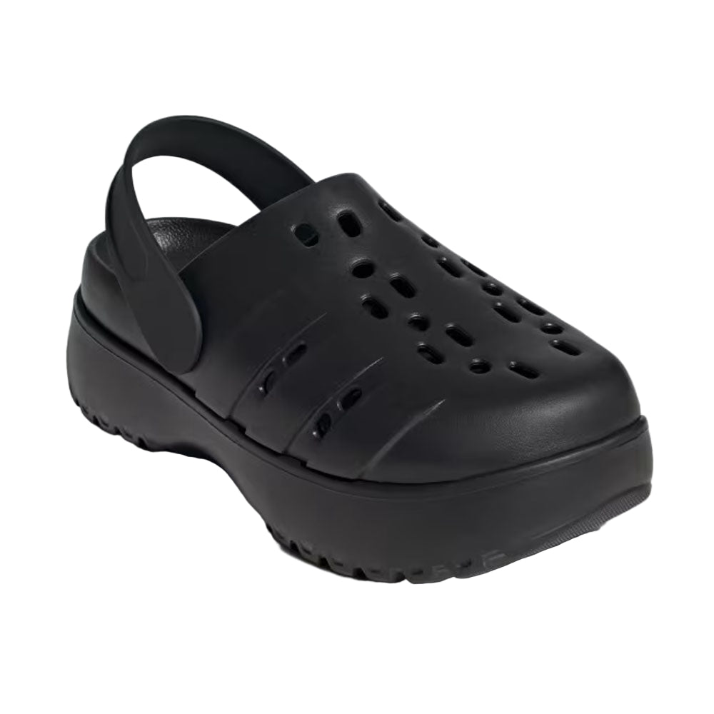 Black clog shoe on a light gray background