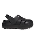 Black clog shoe on a light gray background