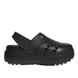 Black clog shoe on a light gray background